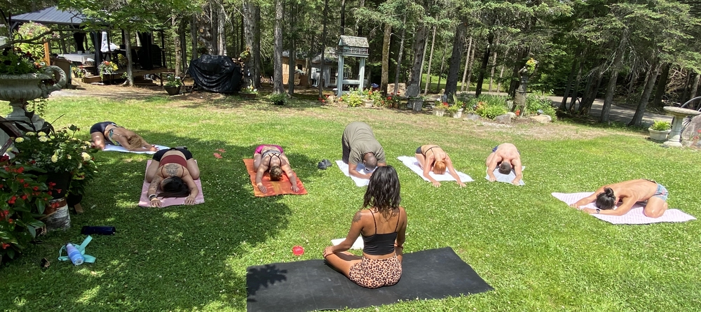 group yoga class child pose